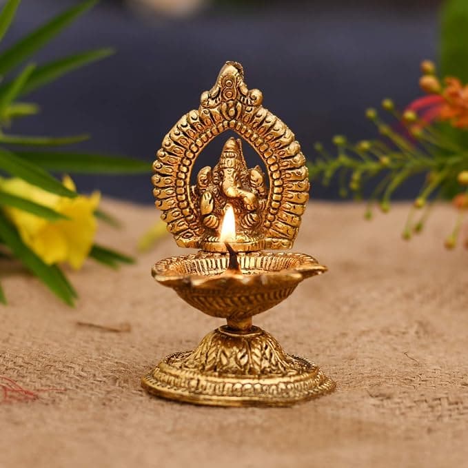 Ganesha Who Holds The Flame